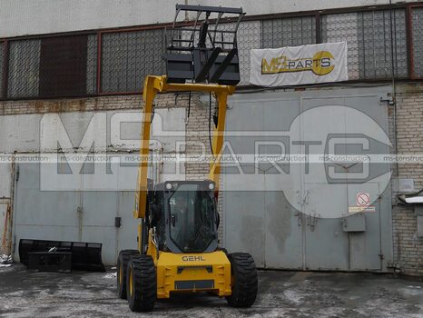 Фото: Вилы с захватом на мини-погрузчик